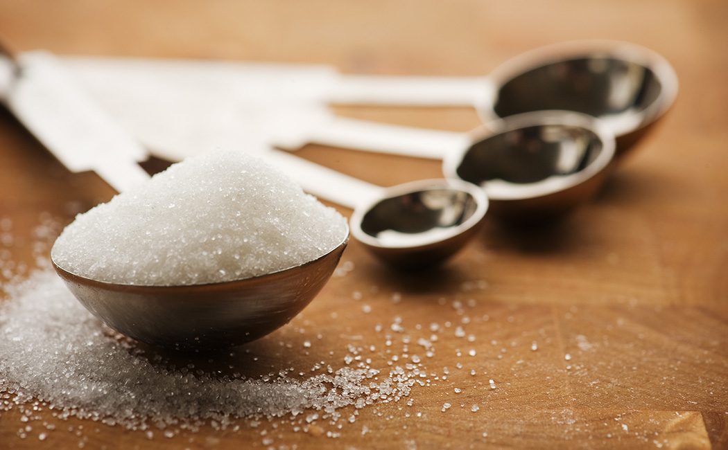 Sweetener in a metal spoon